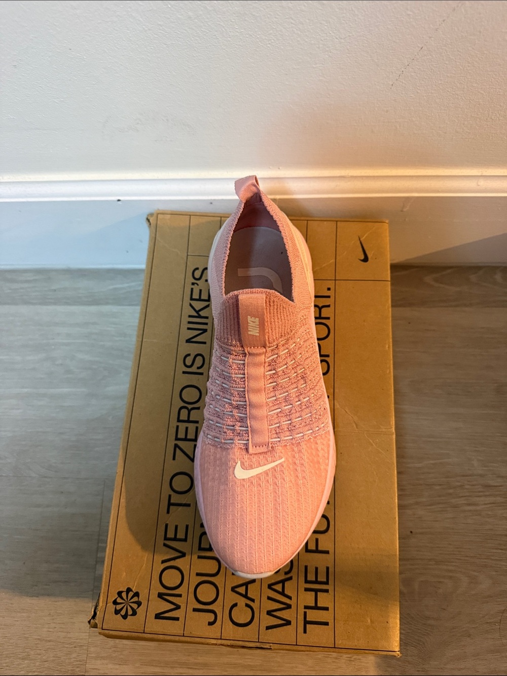 Nike Pink Slip-On Knit Sneaker with White Swoosh